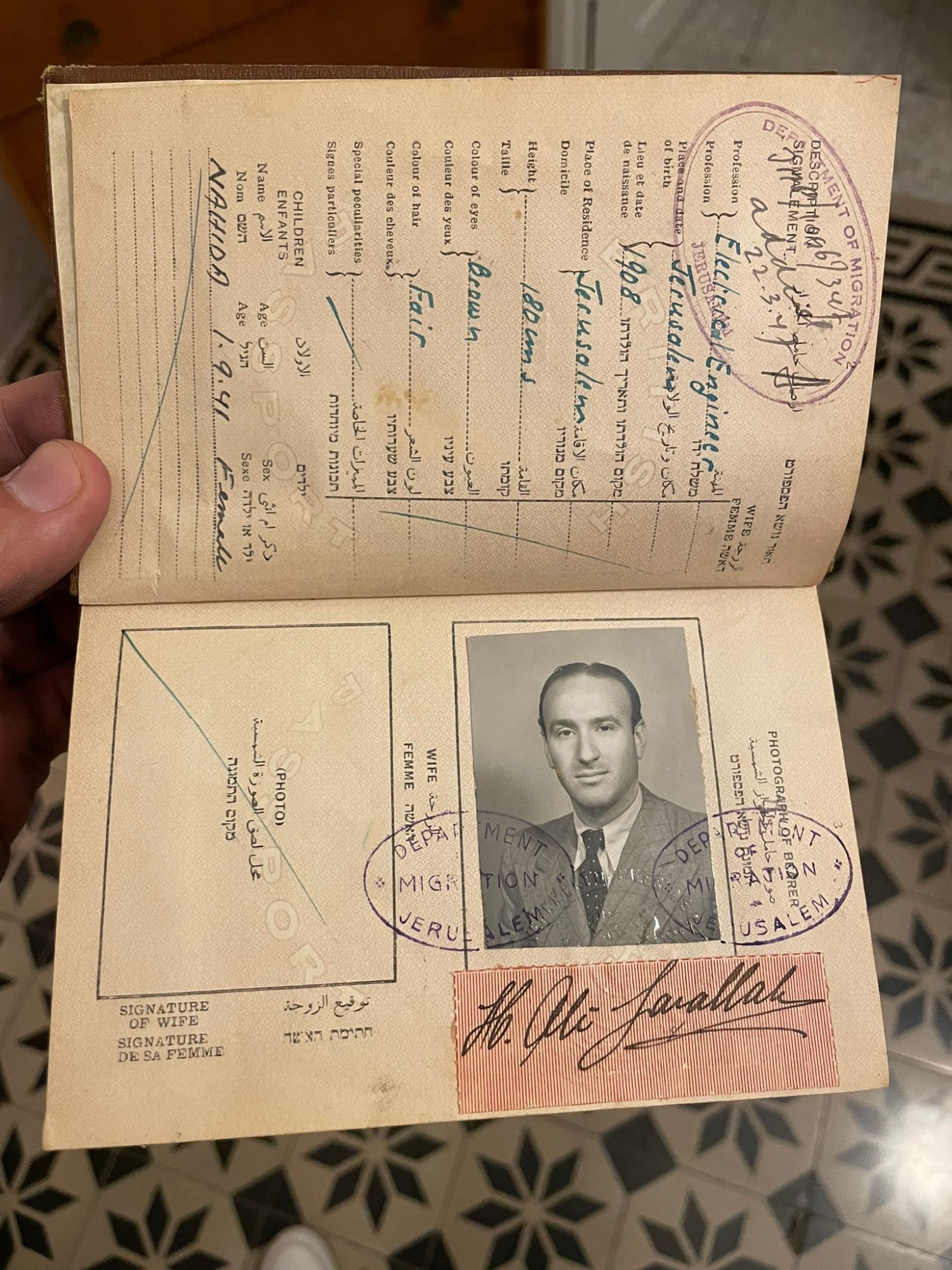 The photo page of a Palestine passport belonging to Hassan Ali Jarallah of Jerusalem, from the Mandate era
