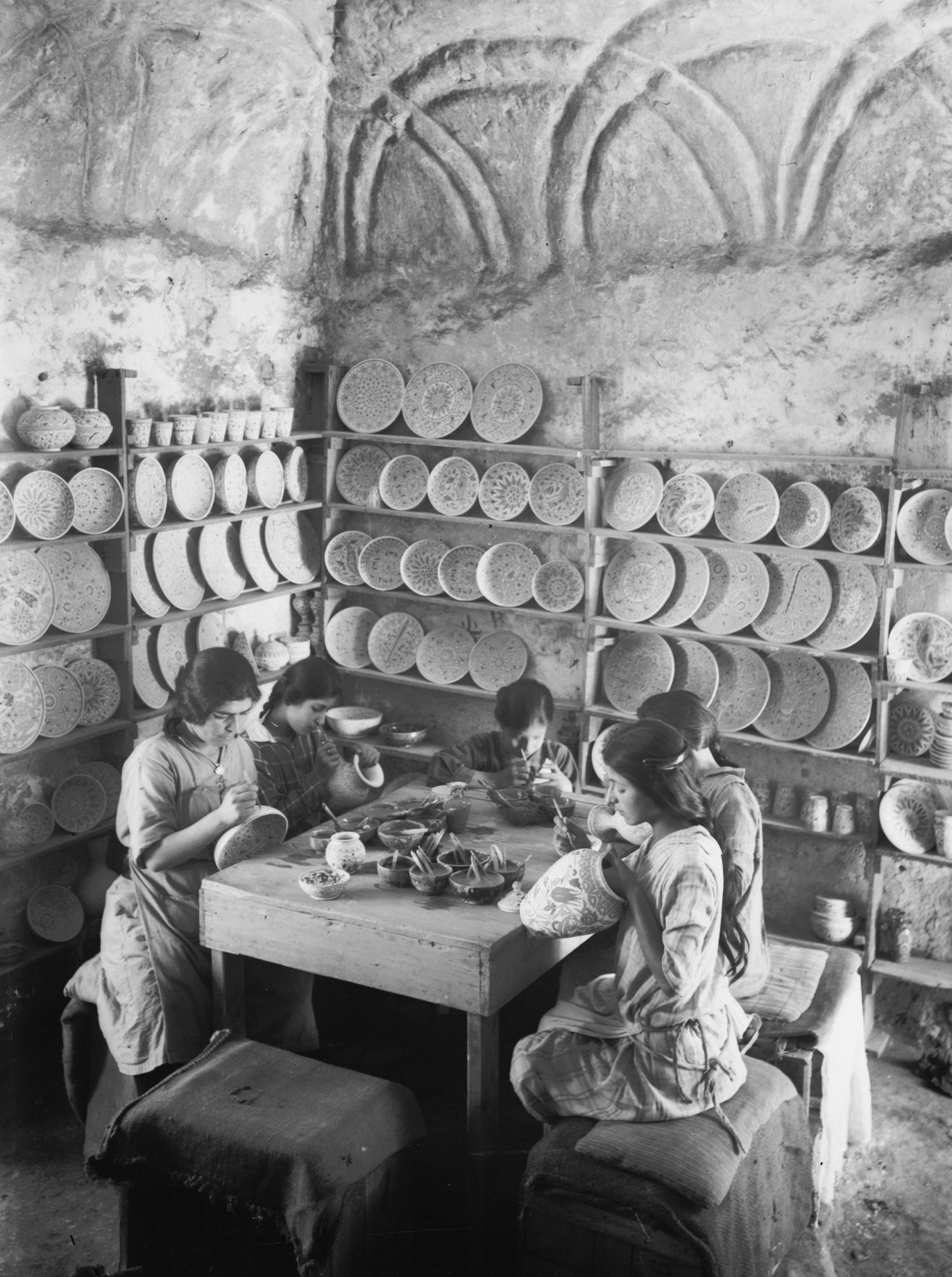 Girls painting pottery vases at the Dome of the Rock Tiles workshop, Via Dolorosa, Jerusalem, 1920s