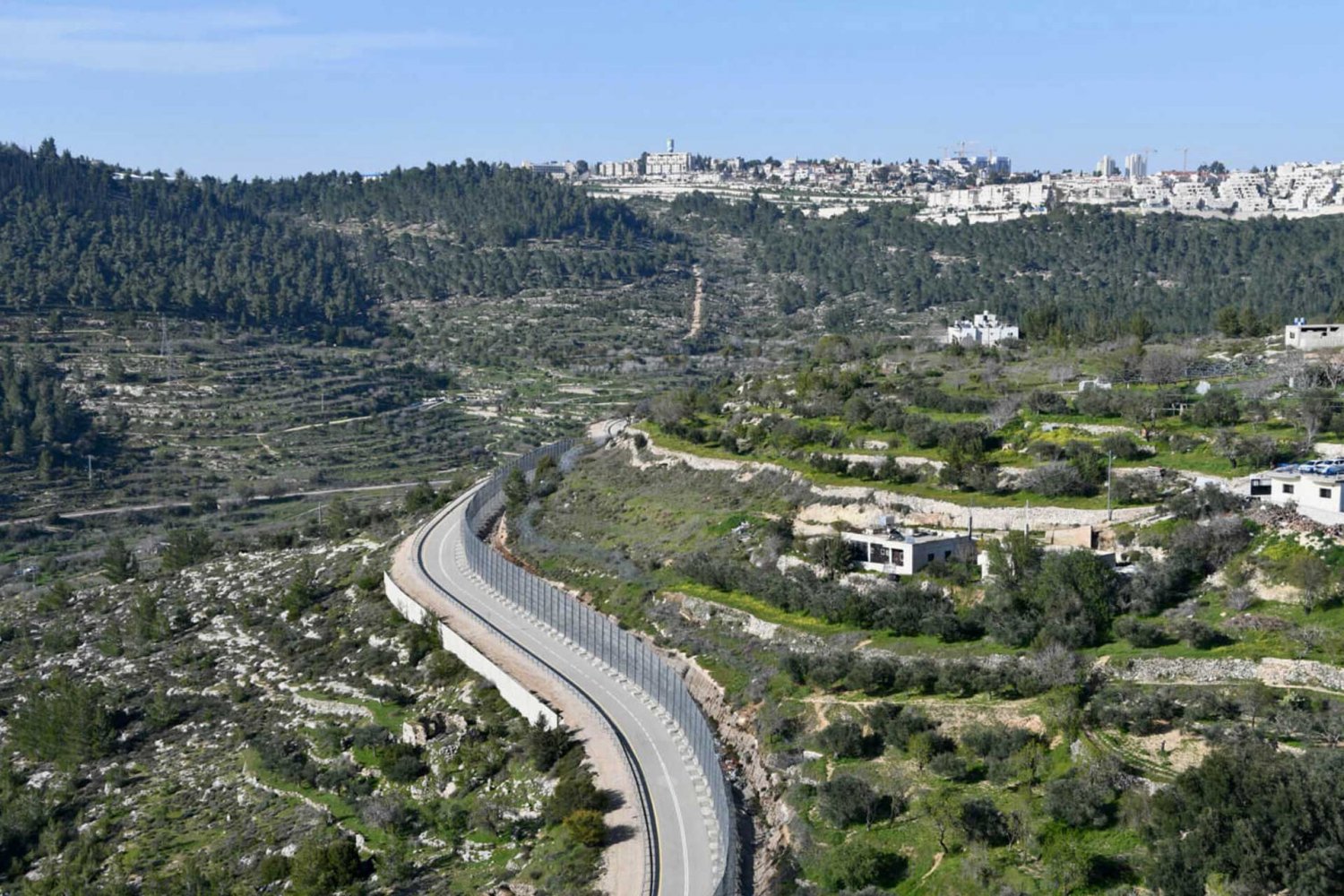The Separation Wall slices through the Palestinian agricultural village of al-Walaja